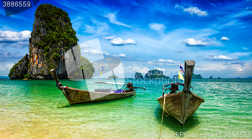 Image of Long tail boats on beach, Thailand