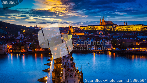 Image of Night view of Prague castle and Charles Bridge over Vltava river