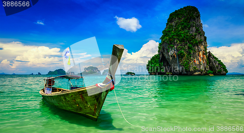 Image of Long tail boat on beach, Thailand