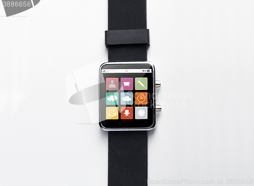 Image of close up of smart watch with menu icons on screen