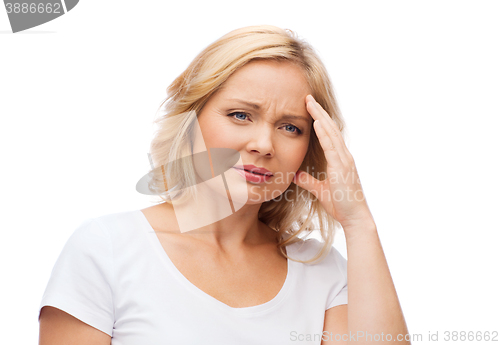 Image of unhappy woman suffering from headache