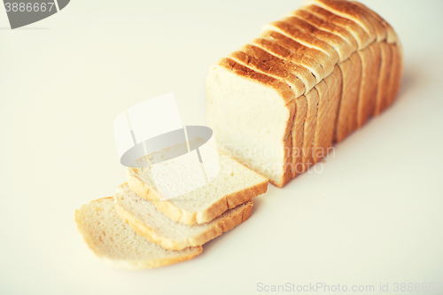 Image of close up of white sliced toast bread on table