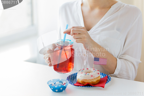 Image of woman celebrating american independence day