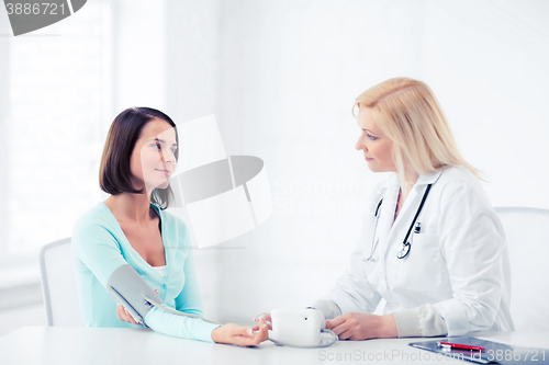 Image of doctor and patient in hospital