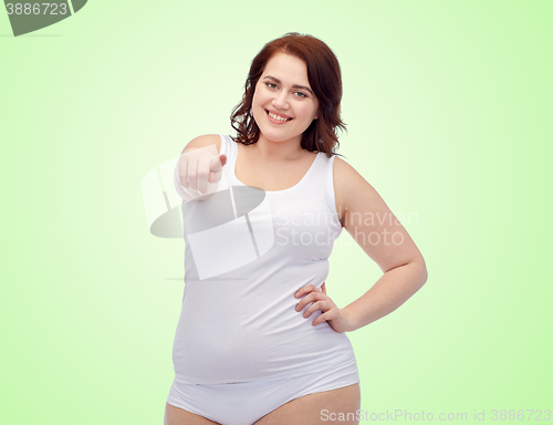 Image of plus size woman in underwear pointing finger