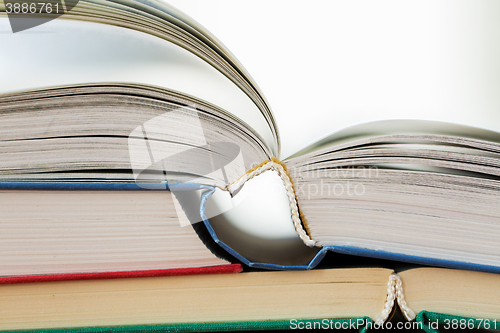 Image of close up of books on wooden table