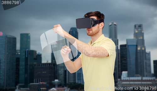 Image of man in virtual reality headset or 3d glasses