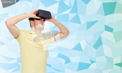 Image of happy man in virtual reality headset or 3d glasses