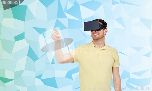 Image of happy man in virtual reality headset or 3d glasses