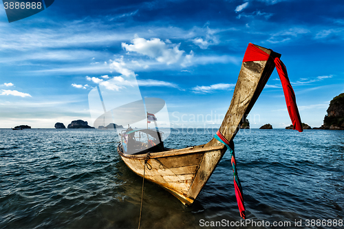 Image of Long tail boat on beach, Thailand