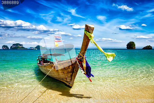 Image of Long tail boat on beach, Thailand