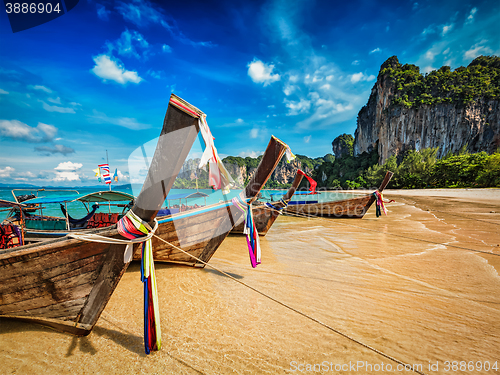 Image of Long tail boats on beach, Thailand