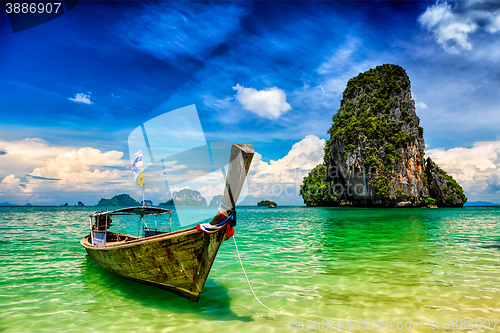 Image of Long tail boat on beach, Thailand