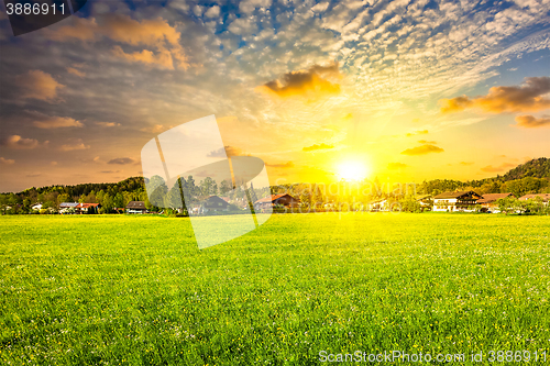 Image of Countryside meadow field on sunset