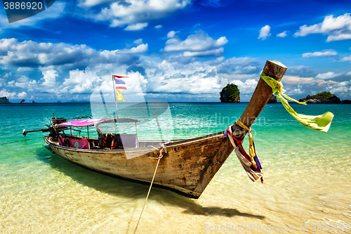 Image of Long tail boat on beach, Thailand