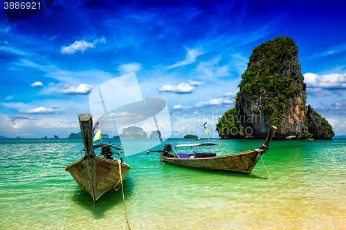 Image of Long tail boats on beach, Thailand