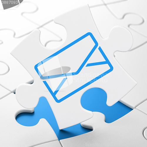 Image of Finance concept: Email on puzzle background