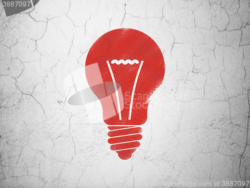 Image of Finance concept: Light Bulb on wall background