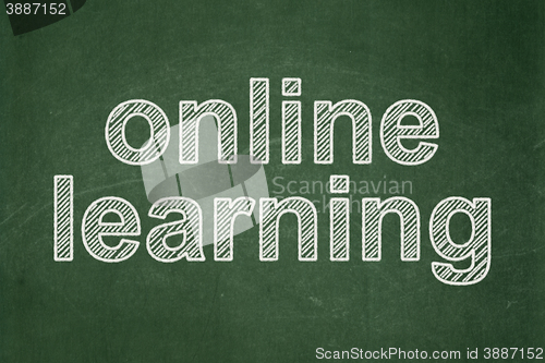 Image of Learning concept: Online Learning on chalkboard background