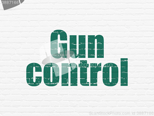 Image of Security concept: Gun Control on wall background