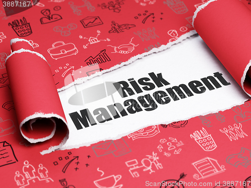 Image of Business concept: black text Risk Management under the piece of  torn paper