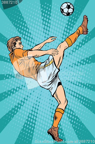 Image of Football soccer player kick the ball