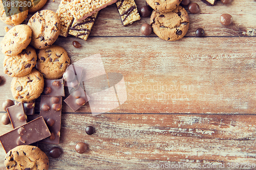 Image of close up of candies, chocolate, muesli and cookies