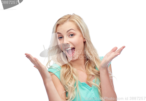 Image of surprised smiling young woman or teenage girl