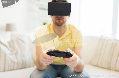 Image of close up of man in virtual reality headset playing