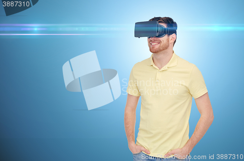 Image of happy man in virtual reality headset or 3d glasses