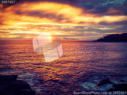 Image of Ocean sunset with dramatic sky