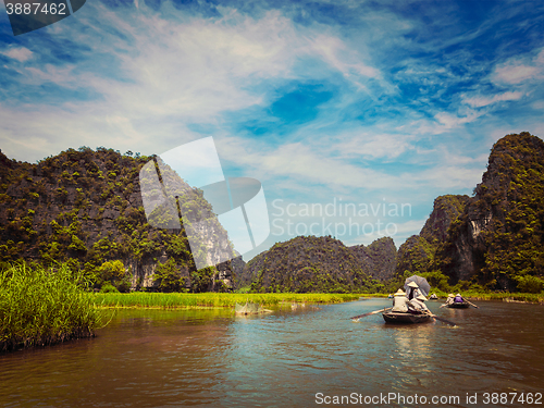 Image of Tourists on boats in Vietnam