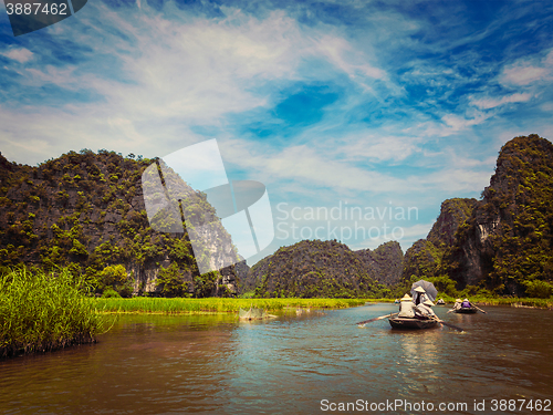 Image of Tourists on boats in Vietnam