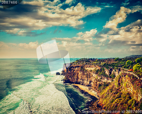 Image of Cliff in ocean on sunset