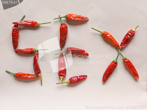 Image of Sex written with hot chili pepper vegetables