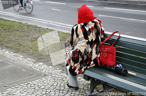 Image of Lady looking at the traffic