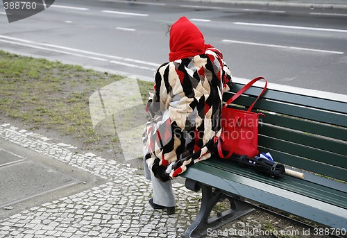 Image of Lonely woman  in fur coat