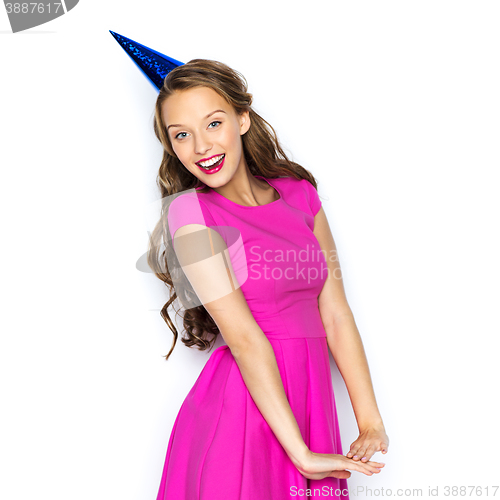 Image of happy young woman or teen girl in party cap