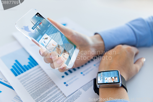 Image of close up of woman with news web page on smartphone