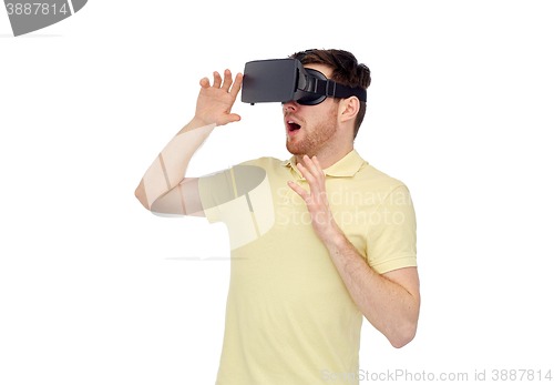 Image of happy man in virtual reality headset or 3d glasses