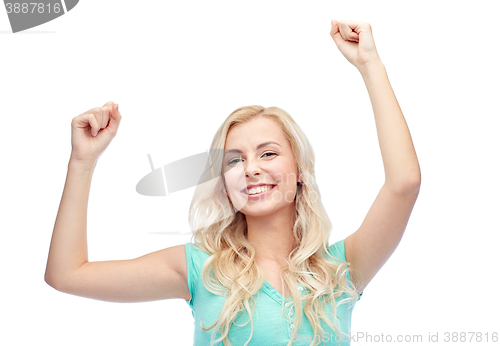 Image of happy young woman or teen girl celebrating victory