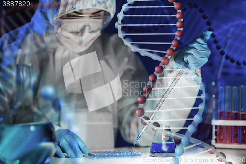 Image of close up of scientist making test in lab