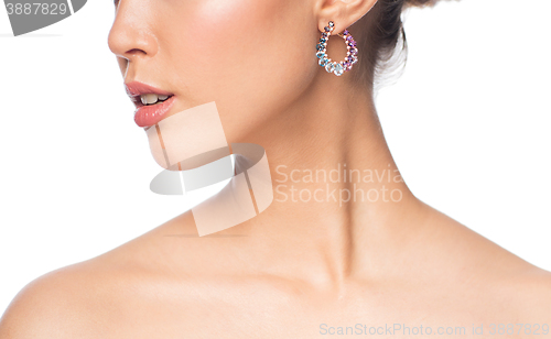 Image of close up of beautiful woman face with earring