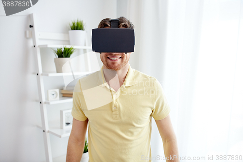 Image of young man in virtual reality headset or 3d glasses