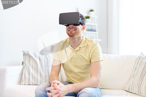 Image of young man in virtual reality headset or 3d glasses