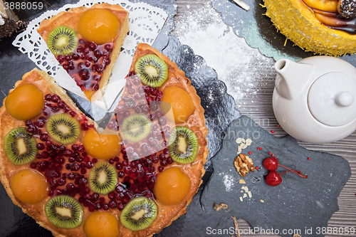 Image of Table with fruit cakes 