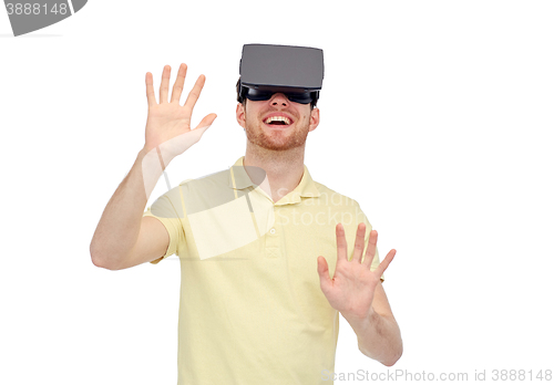 Image of happy man in virtual reality headset or 3d glasses