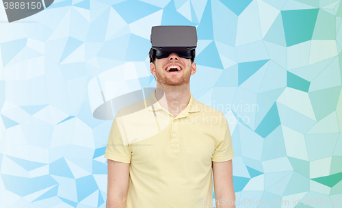 Image of happy man in virtual reality headset or 3d glasses