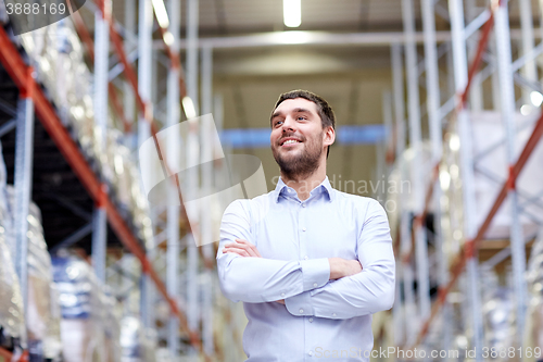 Image of happy man at warehouse