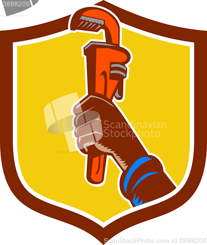 Image of Black Plumber Hand Raising Monkey Wrench Crest